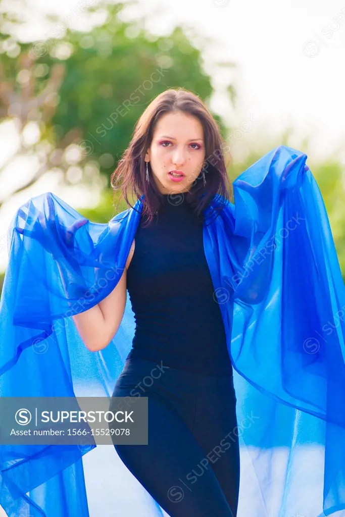 Latin female model poses for pictures in Barcelona, Spain. Barcelona's main languages spoken are Catalan and Spanish.