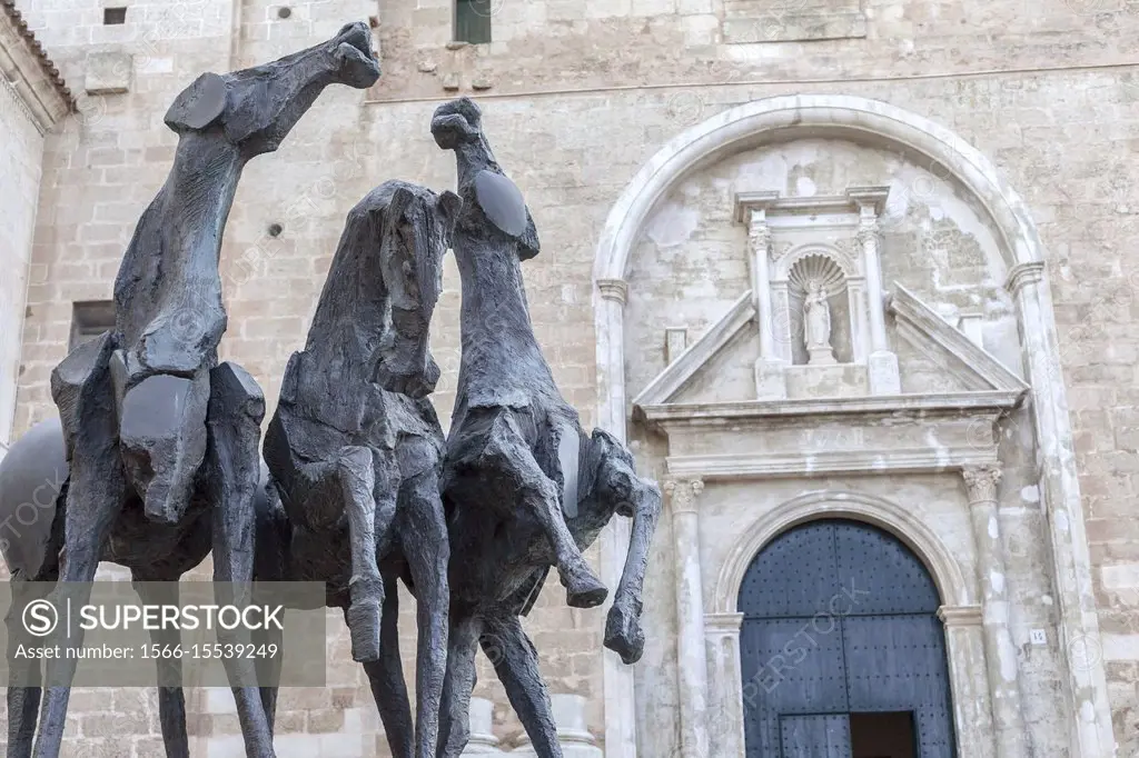 Mahon,Church door and sculpture Tre Cavalli,horses by Nag Arnoldi,Menorca island,Balearic Islands.