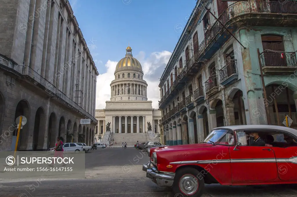 New golden dome of the Capitol of Havana, Cuba, shows gold-plated copper plates that shine on its roof. A thin layer of 24-carat gold was applied to t...