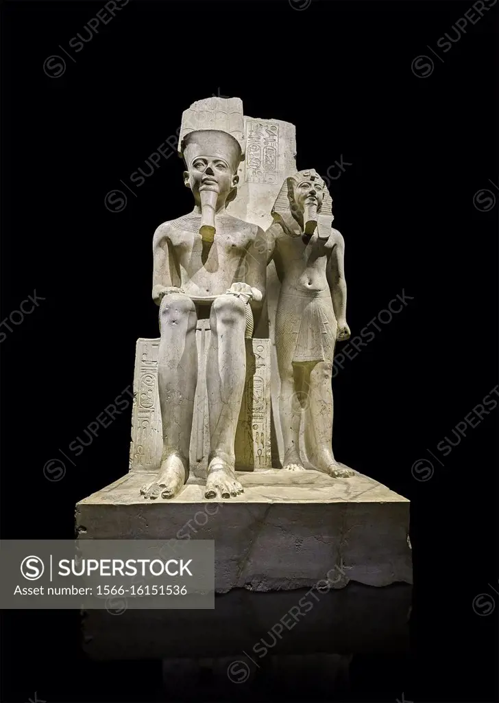 Ancient Egyptian statue of pharaoh Horemheb with god Amun, limestone, New Kingdom, 18th Dynasty, (1319-1292 BC). Egyptian Museum, Turin. black backgro...