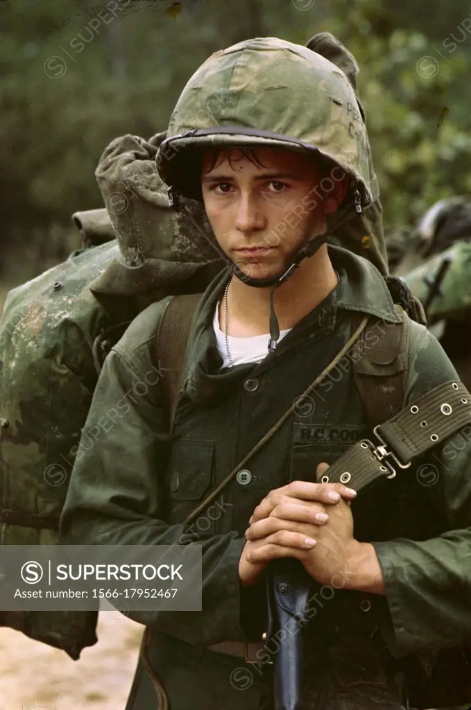 VIETNAM Da Nang -- 03 Aug 1965 -- A young Marine private waits on the beach during the US Marines landing at Da Nang, Vietnam -- Picture by Lightroom ...