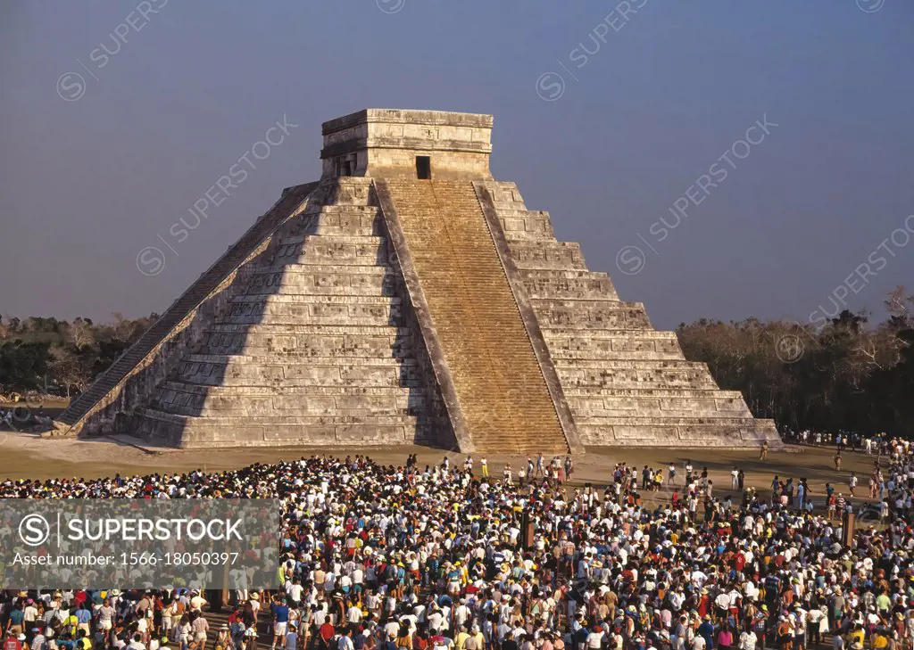 Spring Equinox Celebration. Chichen-itza. Yucatan. Mexico. . On the Spring and Autumn equinoxes, in the late afternoon, the northwest corner of the py...