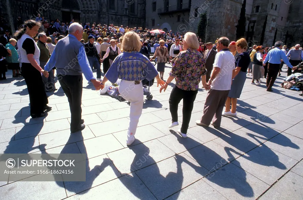 sardana dance, barcelona, spain.