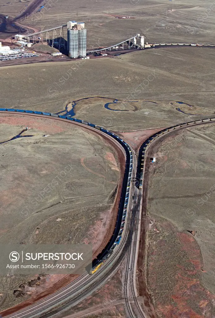 Gillette, Wyoming - An aerial view of a coal train loading facility at a surface coal mine in Wyoming´s Powder River Basin  The train on the right tra...