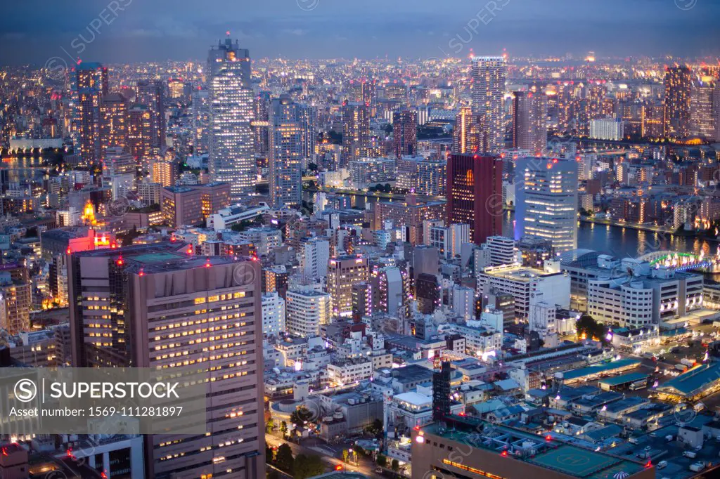 View of crowded cityscape at dusk