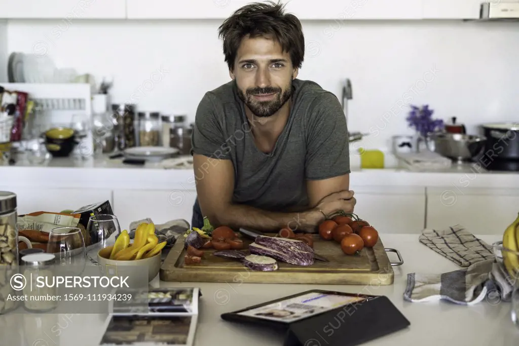 Man preparing food in kitchen