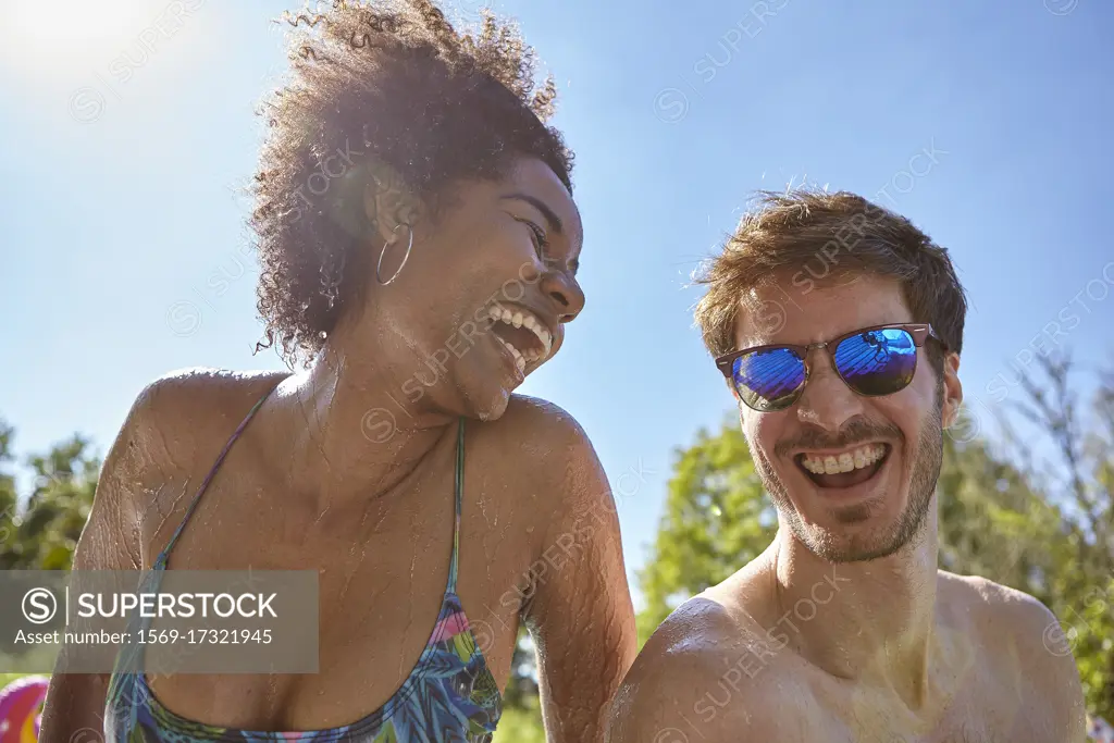 Young friends enjoying pool party