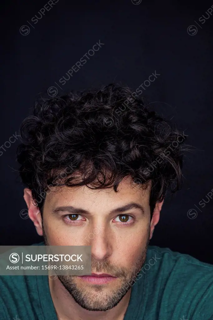 Man with one eyebrow raised, portrait