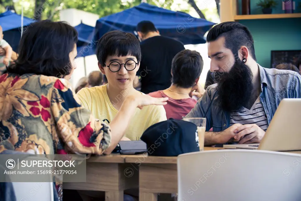 Woman talking to companions