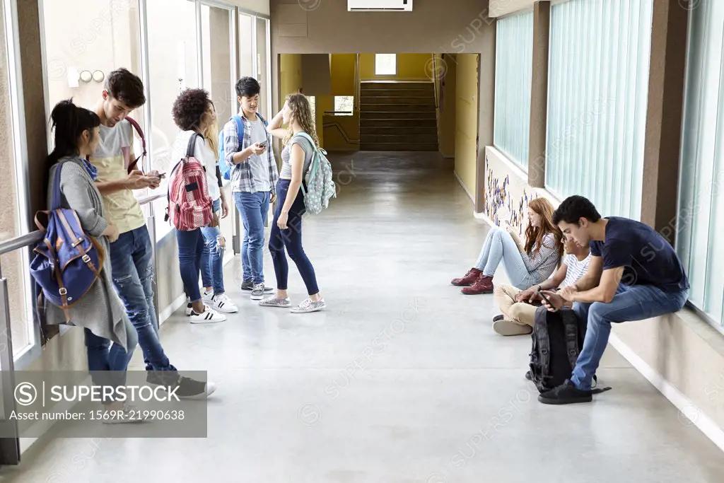 Students killing time in corridor between classes