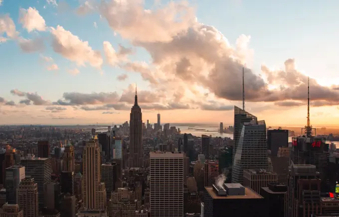 View of Empire State building with modern cityscape