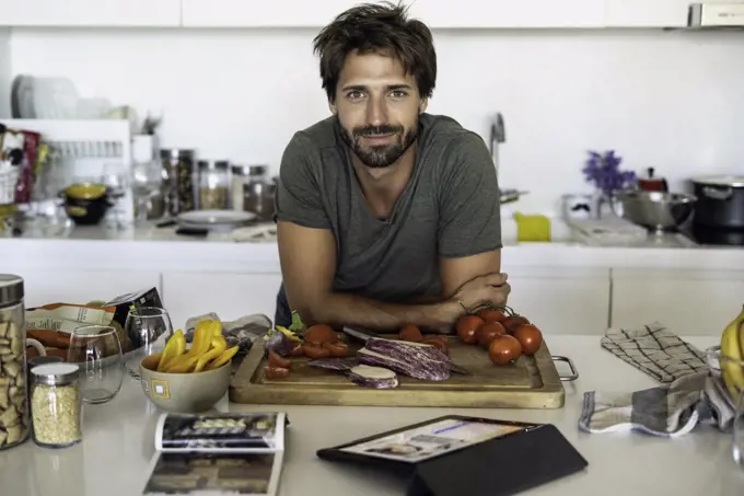 Man preparing food in kitchen