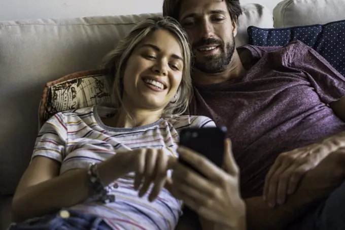 Couple using smart phone