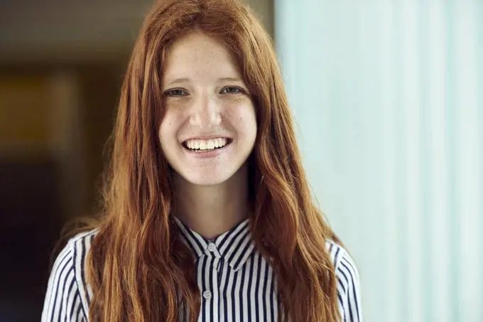 Young woman smiling, portrait