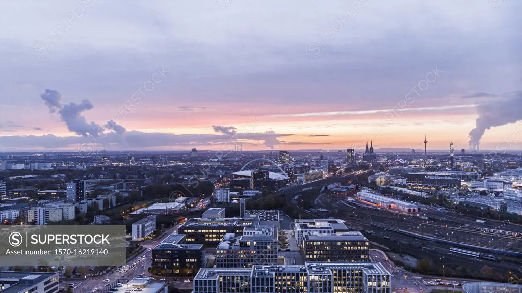 Cologne cityscape at sunset, Germany