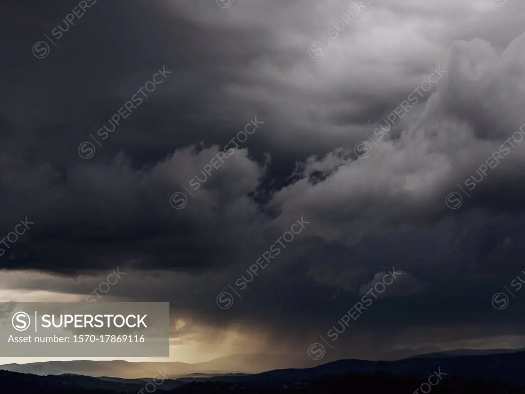 Dark gray storm clouds over landscape, Montauroux, French Riviera, France