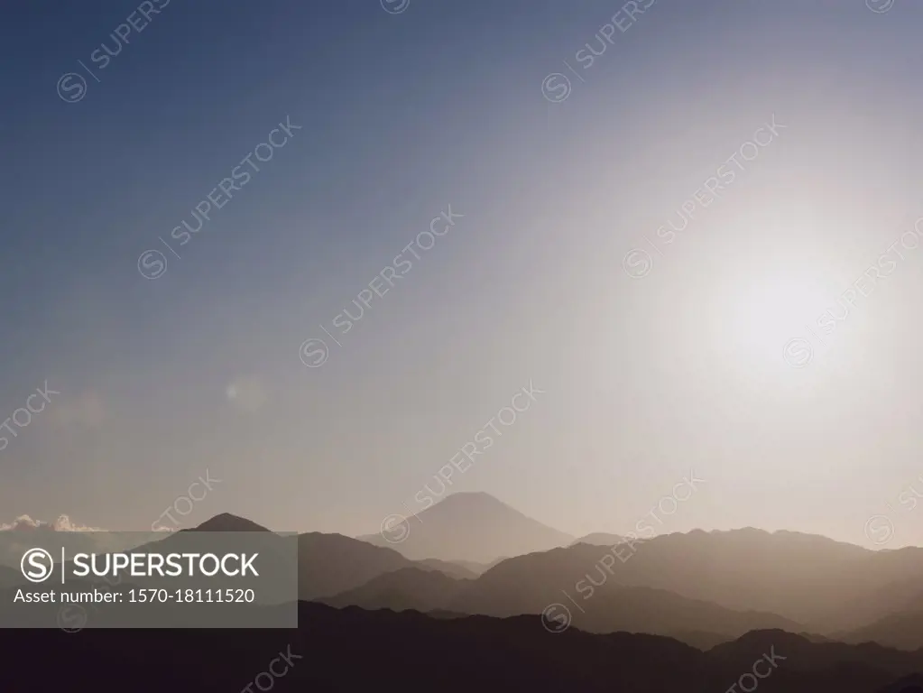 Scenic tranquil silhouette view Mount Fuji at sunrise, Fuji-Hakone-Izu National Park, Japan