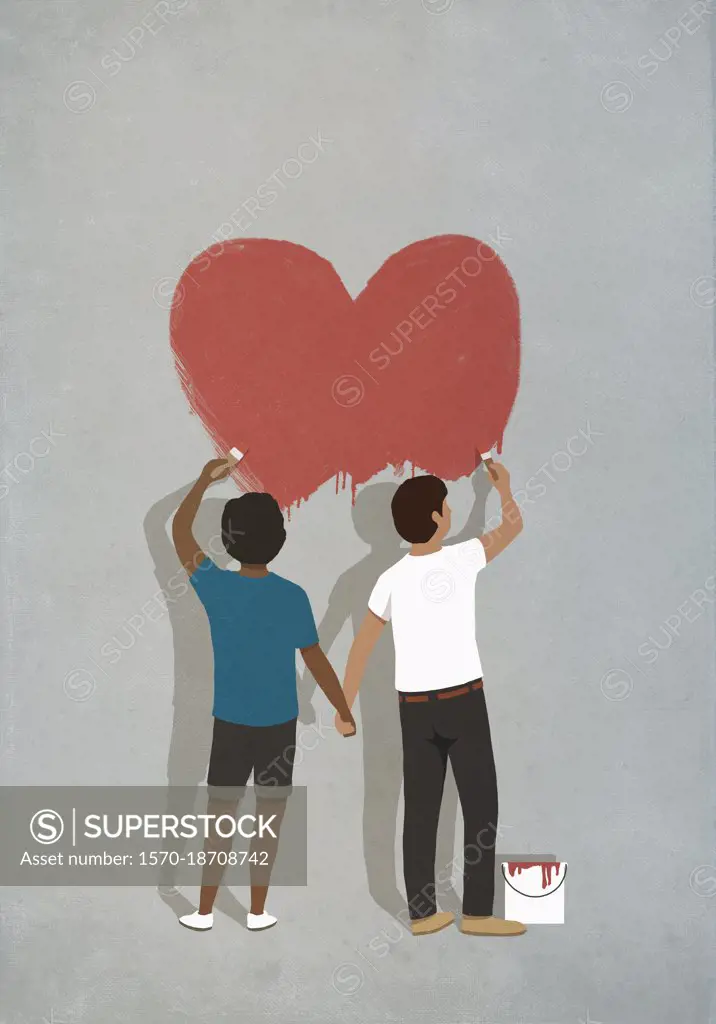 Couple holding hands painting heart on wall