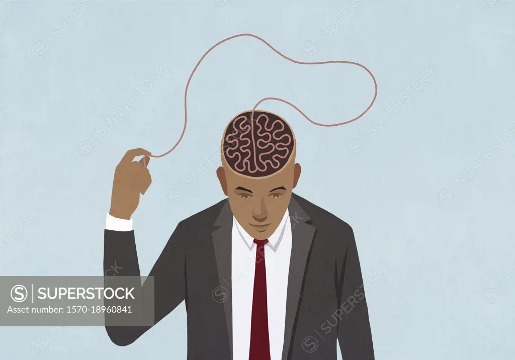 Businessman pulling at brain string