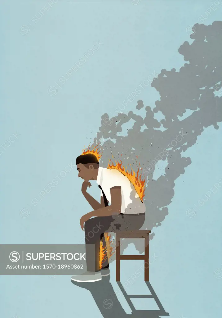 Businessman with back, legs and head on fire