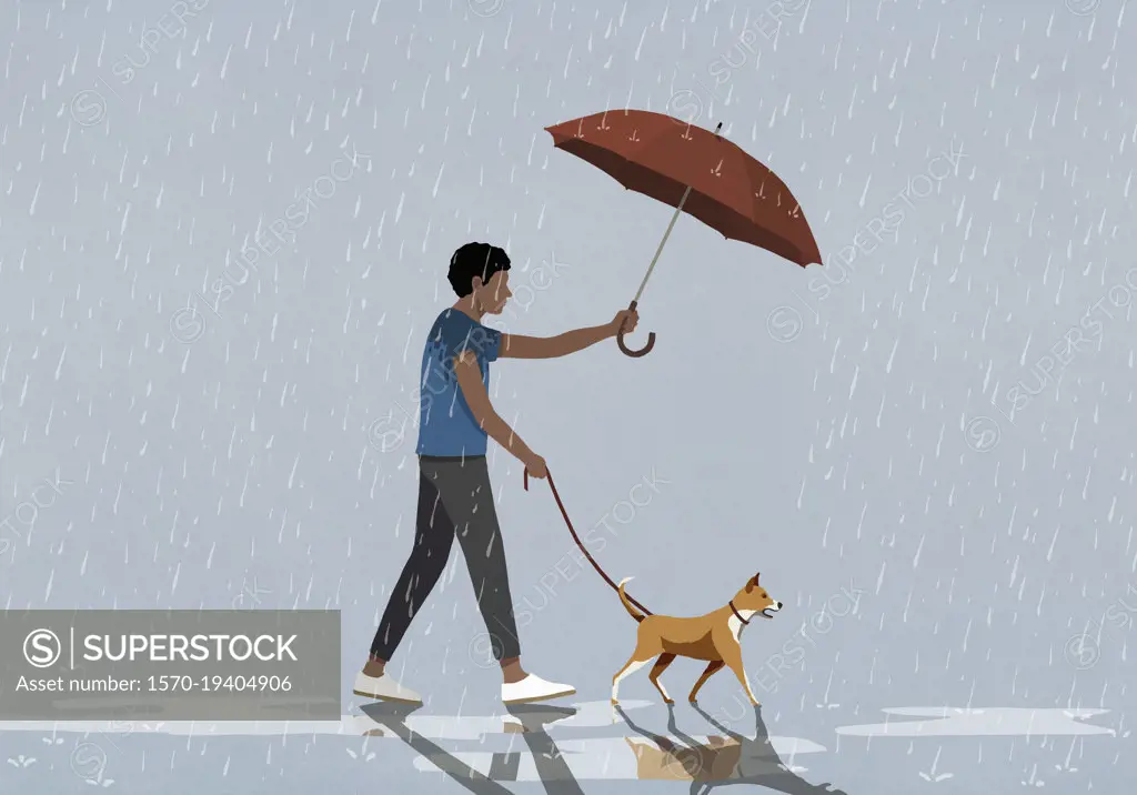 Man holding umbrella over dog on leash walking in rain