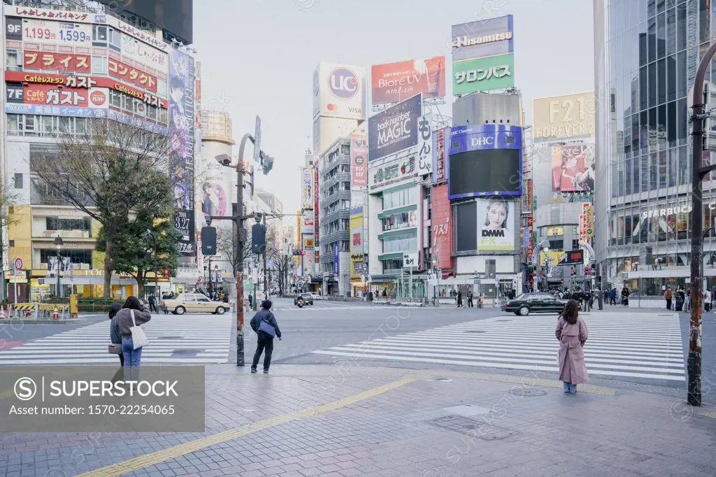 Pedestrians on modern city street, Tokyo, Japan