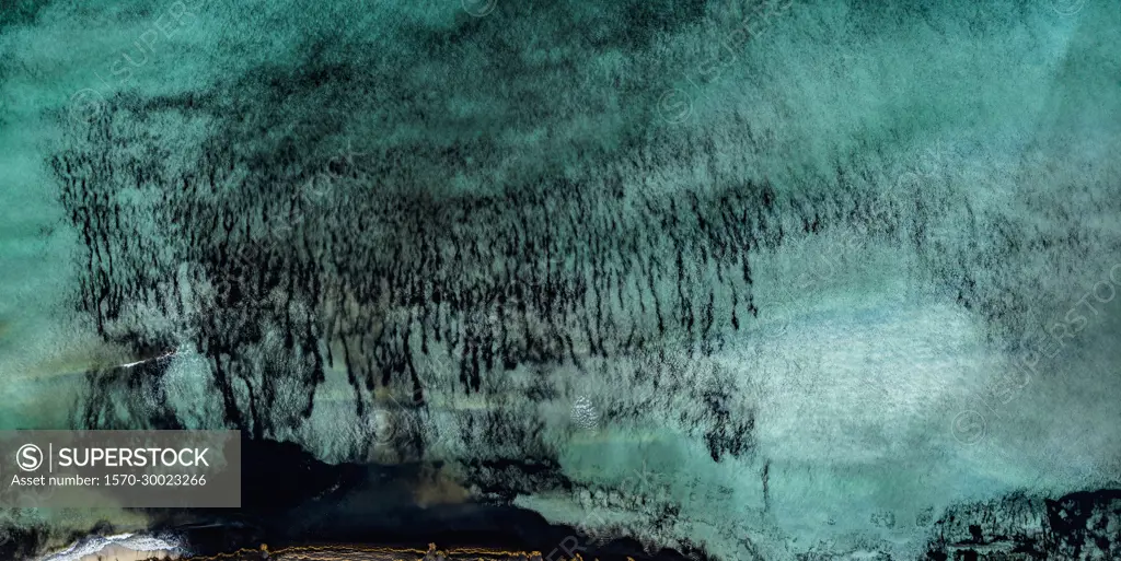 Aerial view vibrant turquoise ocean at the beach of Es Trenc, Majorca, Spain