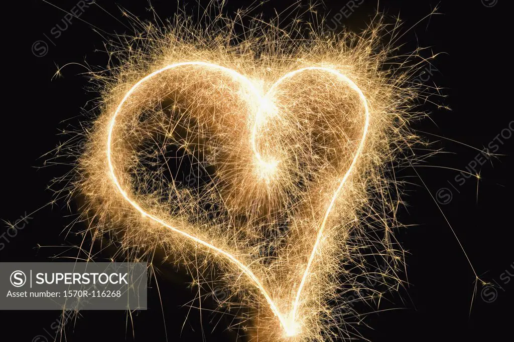 A heart shape drawn with a sparkler