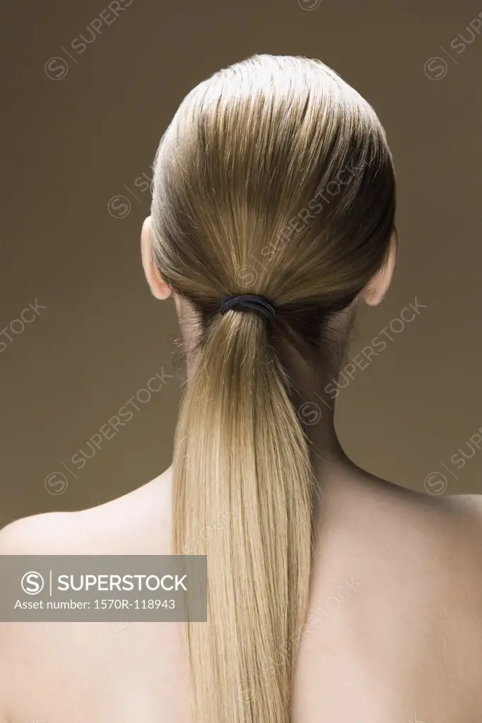 Rear view of a woman with a long ponytail