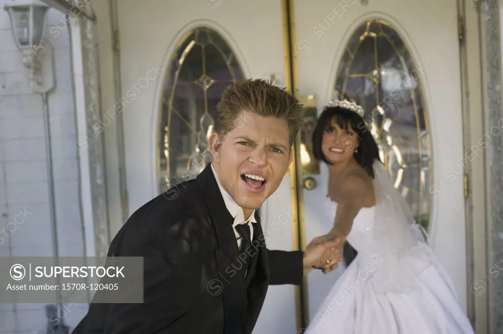 Bride dragging groom into a wedding chapel