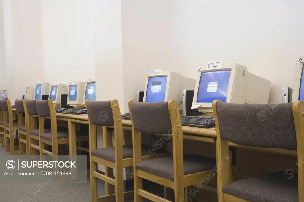 A row of computers in school library