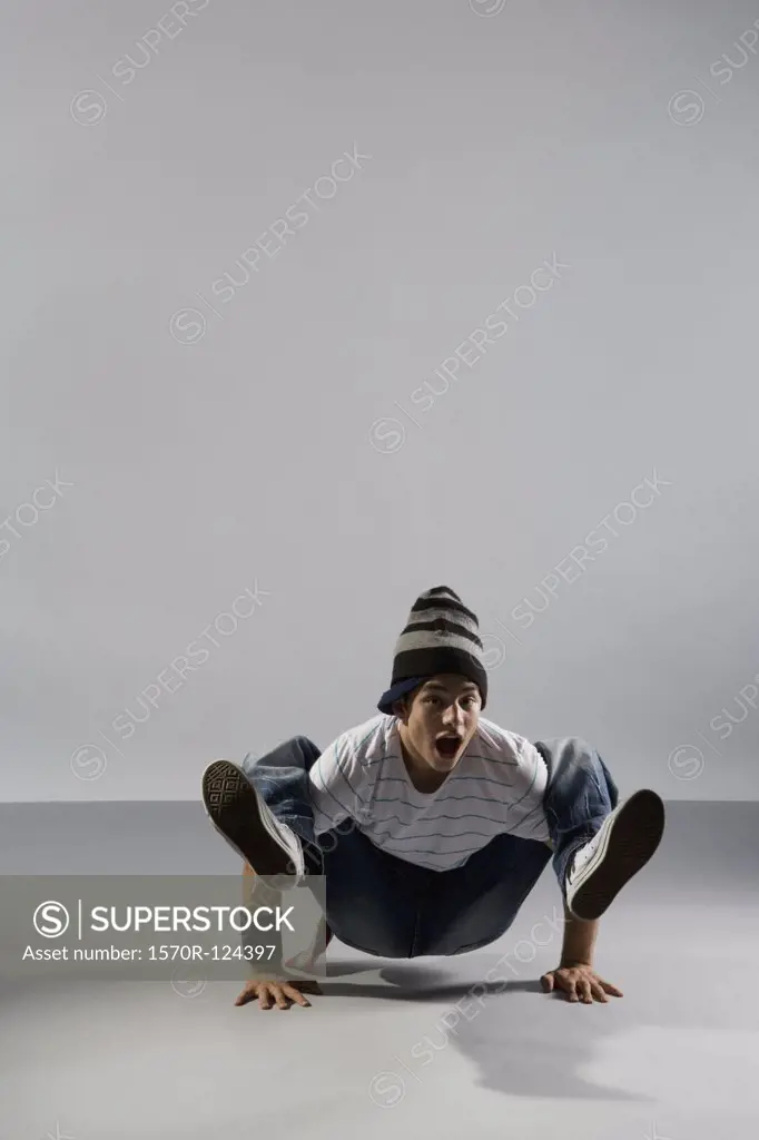 A B-boy doing a Crab breakdance move