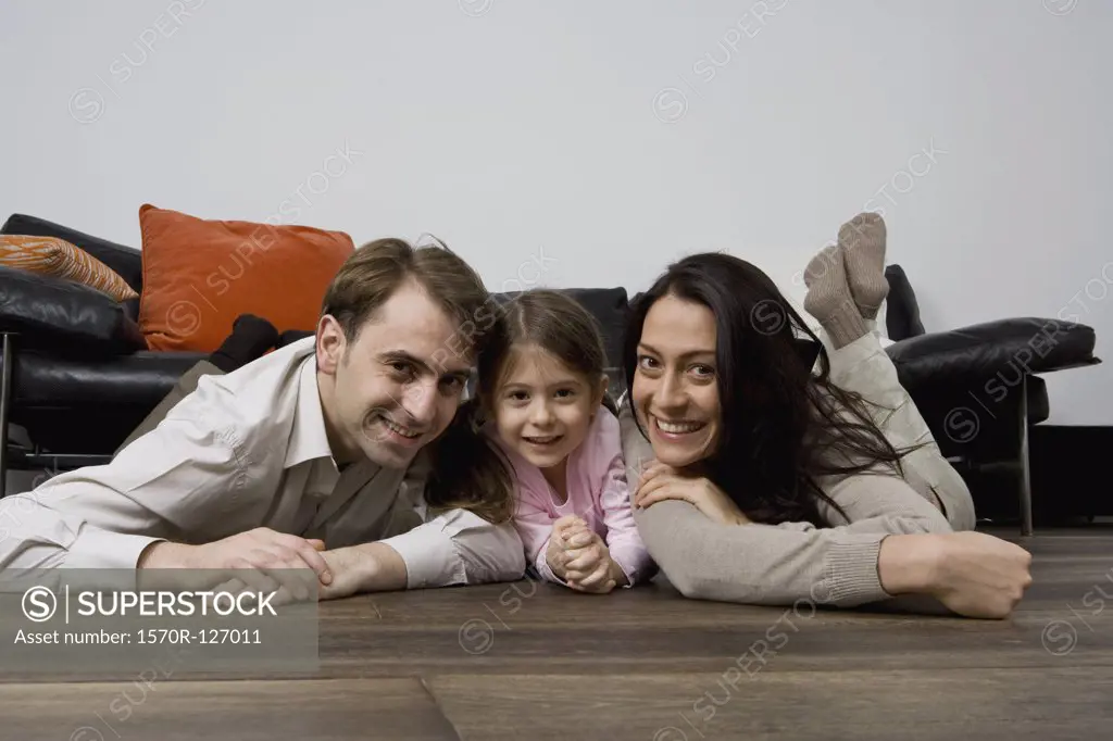 Portrait of two parents and their child