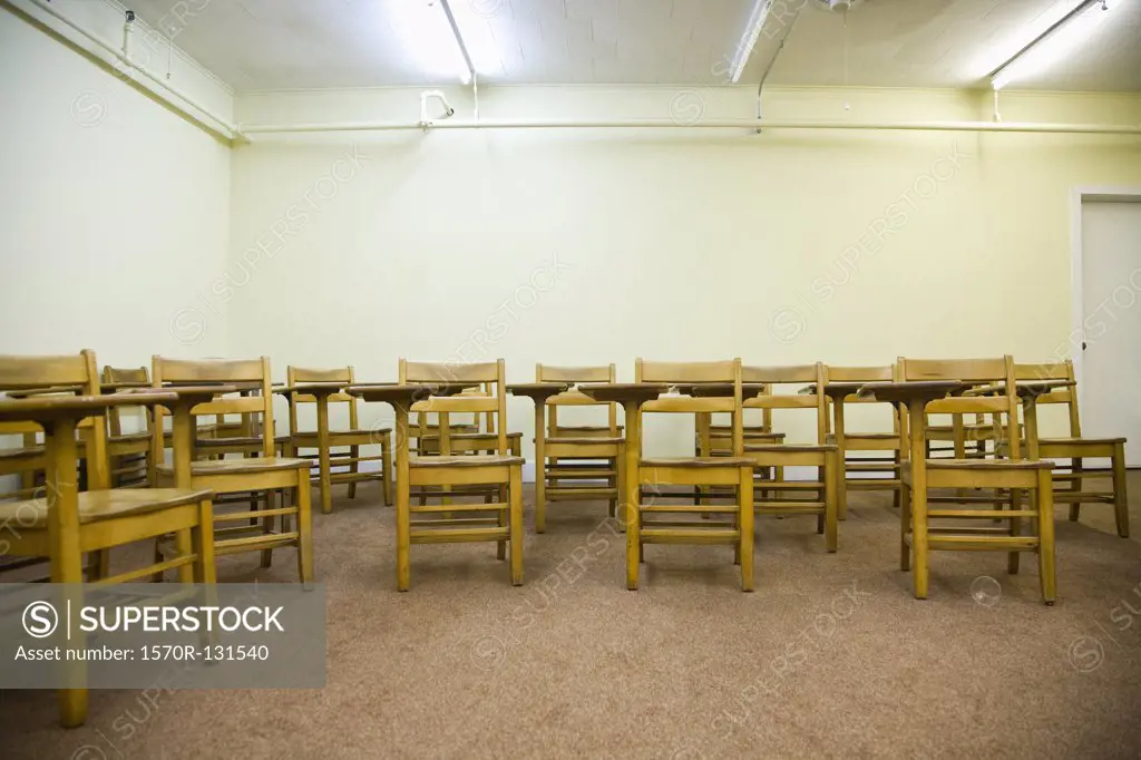 School desks in an empty classroom