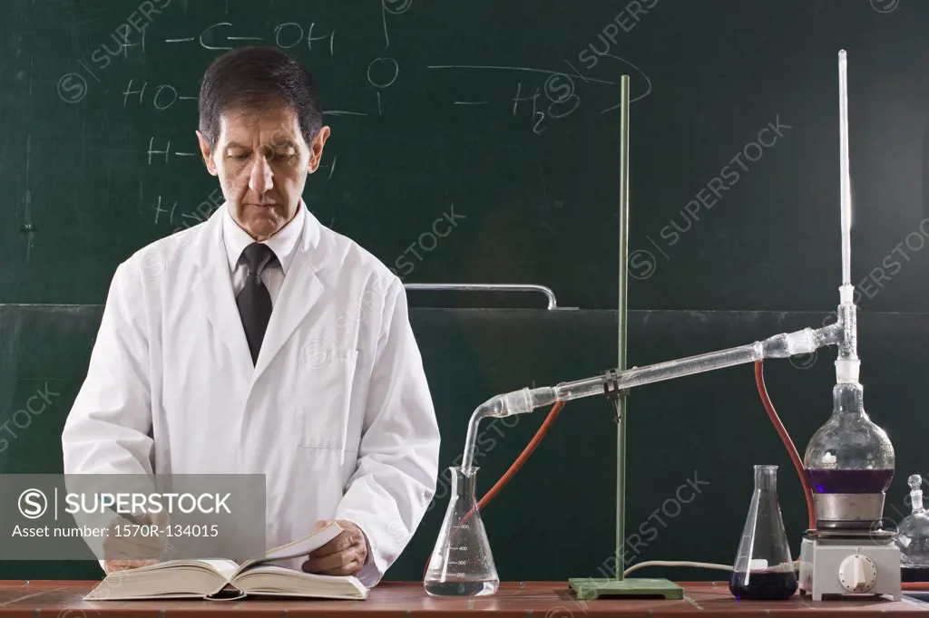 A chemistry teacher conducting an experiment in a classroom