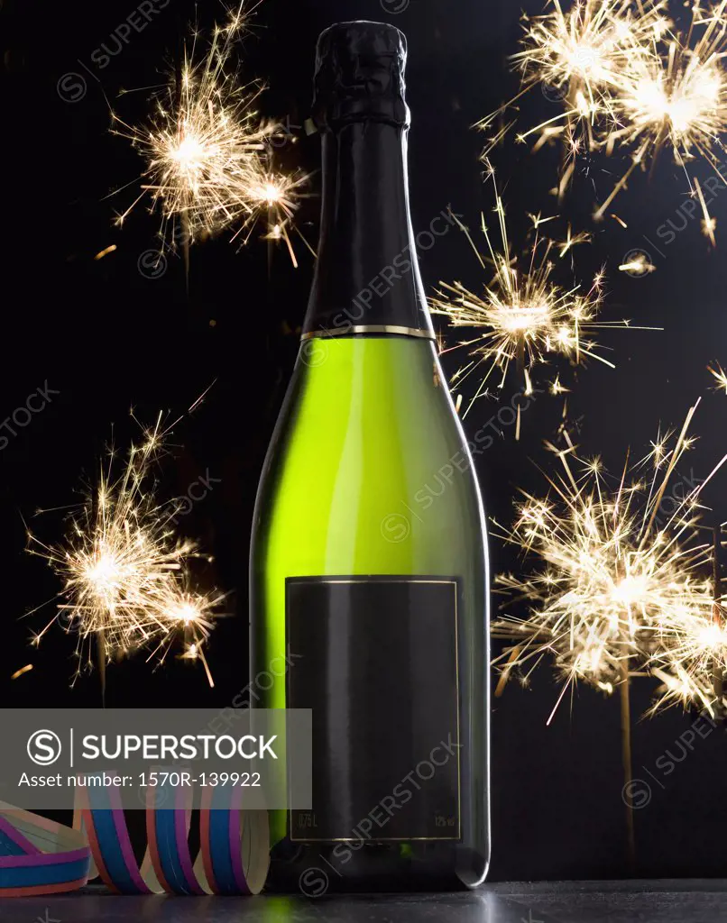 A bottle of champagne and sparklers