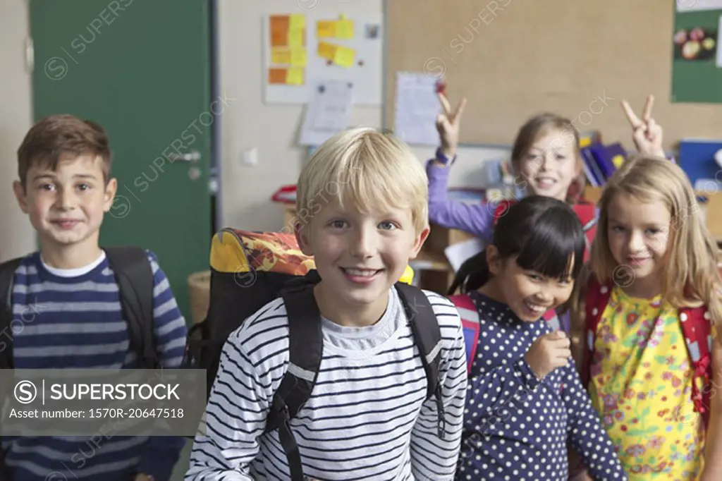 Students having fun together in classroom