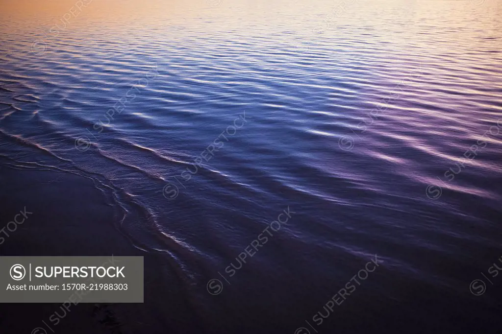 Full frame shot of rippled sea during sunset