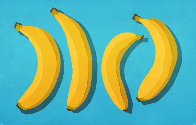 Unpeeled bananas on blue background