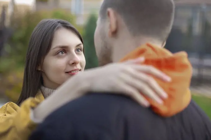 Affectionate young couple hugging