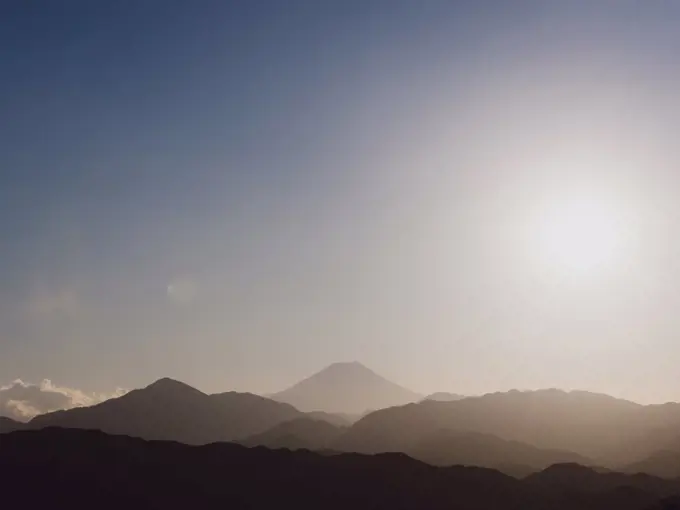 Scenic tranquil silhouette view Mount Fuji at sunrise, Fuji-Hakone-Izu National Park, Japan