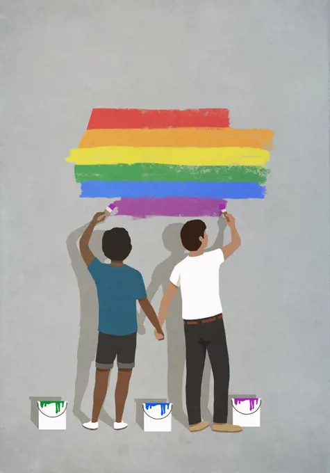 Couple holding hands painting rainbow on wall