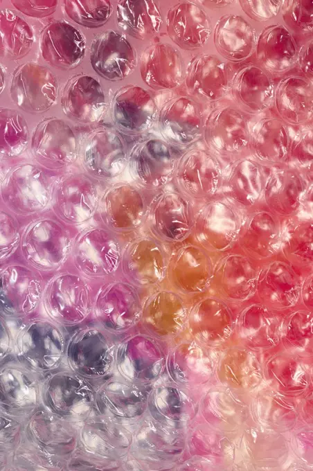 Bubble wrap over multicolor background