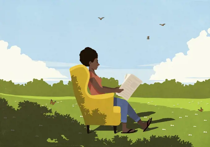 Serene woman in armchair reading newspaper in sunny, idyllic meadow