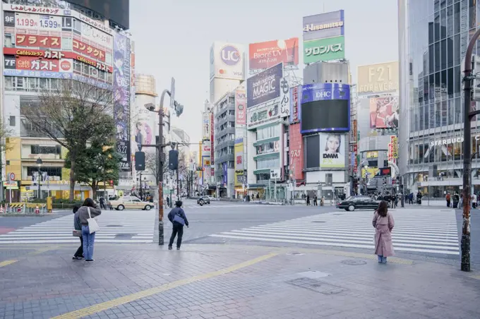 Pedestrians on modern city street, Tokyo, Japan