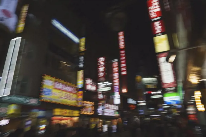 Modern, urban city street at night, Shibuya, Tokyo, Japan