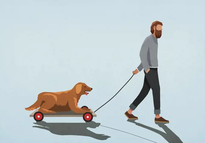 Man pulling dog on cart