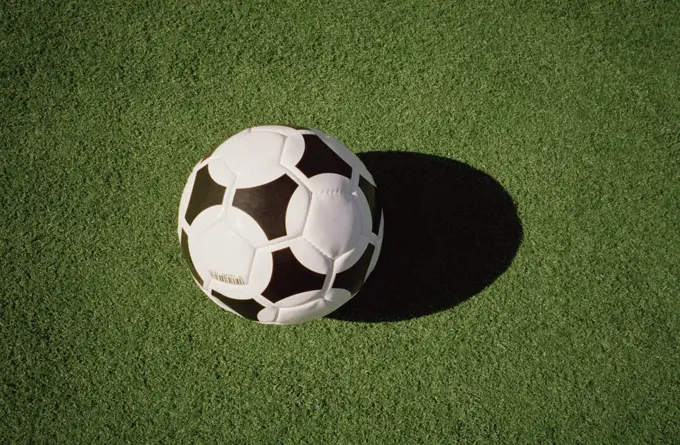 Close-up of soccer ball on playing field