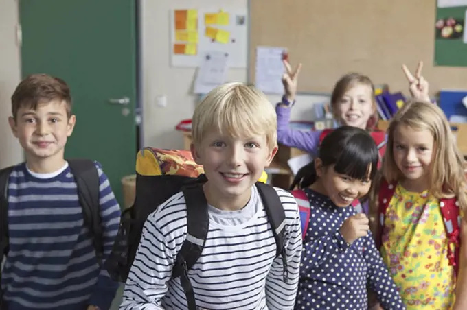 Students having fun together in classroom