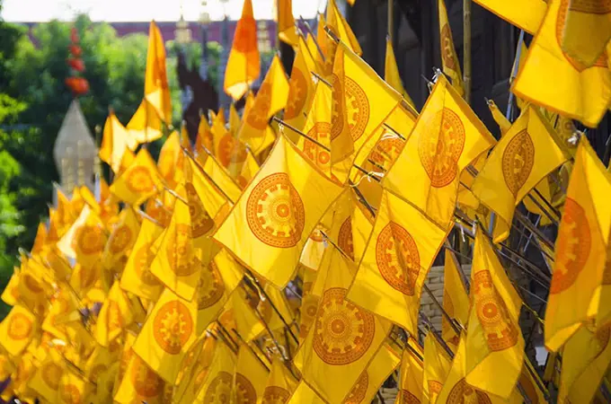 Close-up of yellow prayer flags at temple